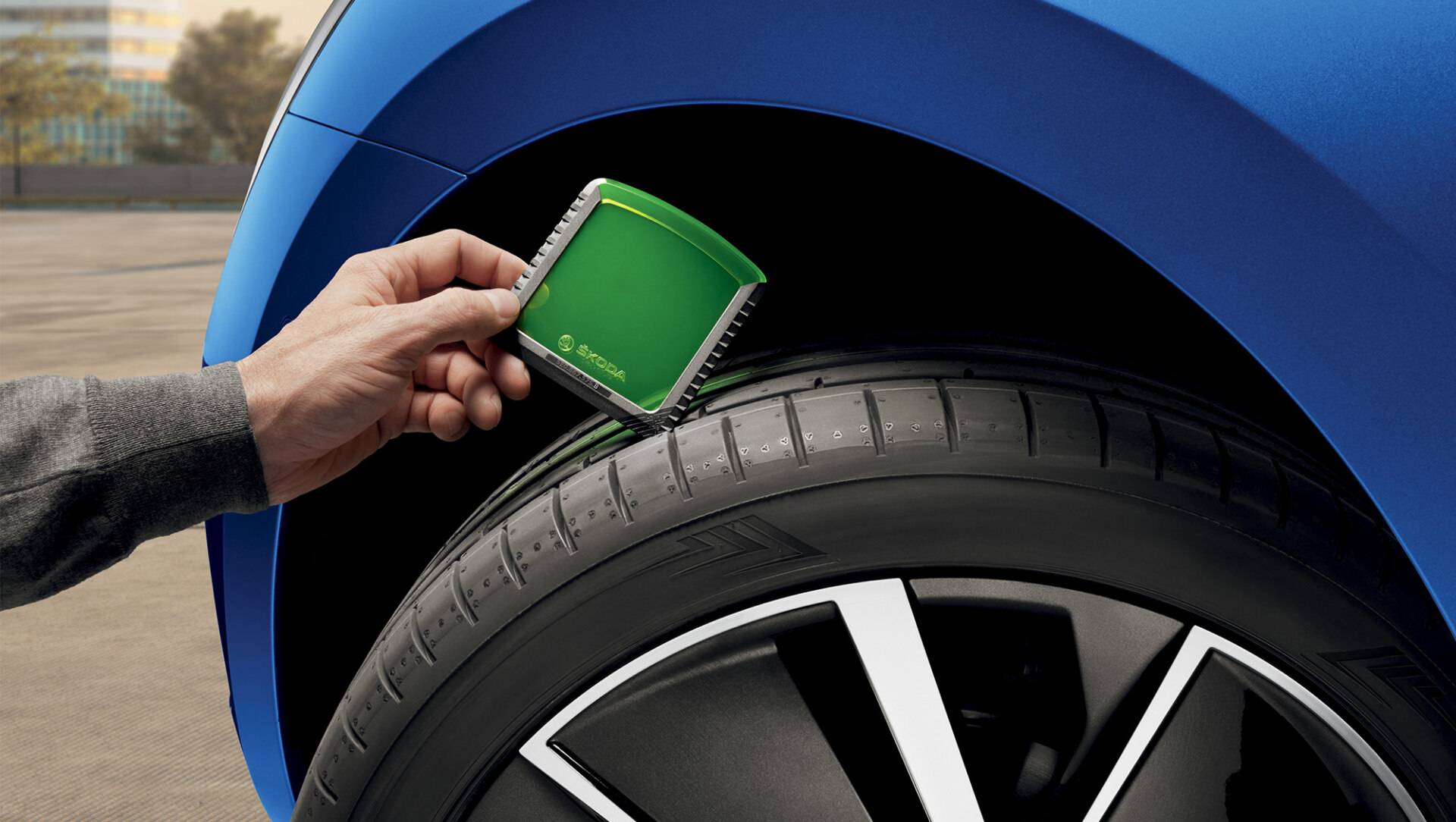 The current version of the scraper also conceals a tire tread depth gauge.